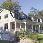 White house with big porch | Cardoso Electrical Services